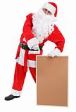 Santa claus shows empty bulletin board
