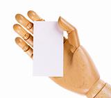 Wooden hand with white card