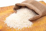 White rice in small burlap sack 