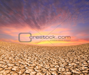 sunset on the ground dried by dryness 
