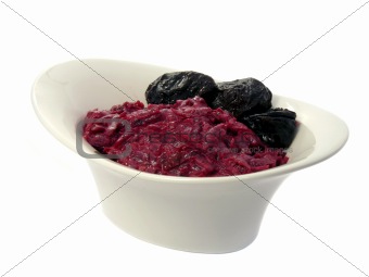 Beetroot salad with plums isolated on a white background 