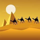 tourists on camels in desert