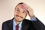 The businessman wipes a forehead by kerchief