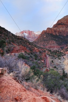 Zion National Park with red rocks, road and snow