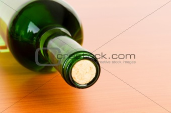 Bottle of wine on the wooden table
