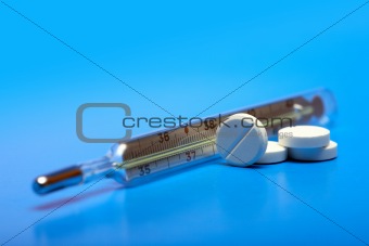 Pills And Thermometer