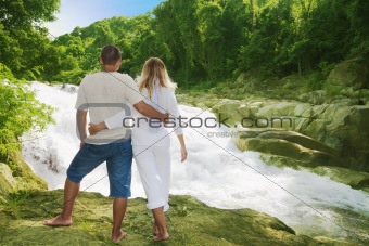 Couple near waterfall