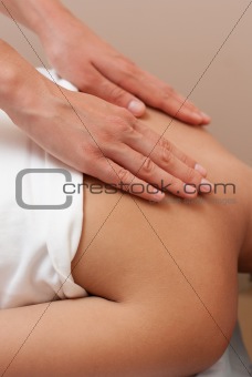 young woman receives massage