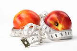 Tape measure and nectarines
