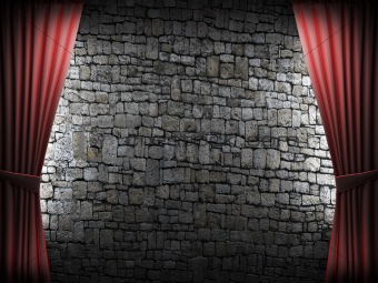Red velvet curtain and stone wall