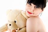Young woman with teddy bear  