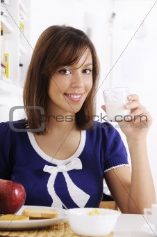 young woman drinking milk 