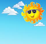 Happy Sun with sunglasses on sky