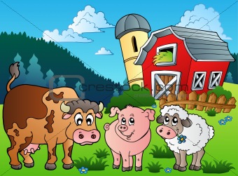 Three farm animals near barn