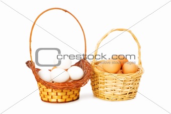 Basket full of eggs isolated on white