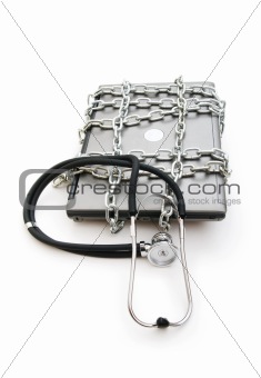 Computer security concept with laptop and stethoscope