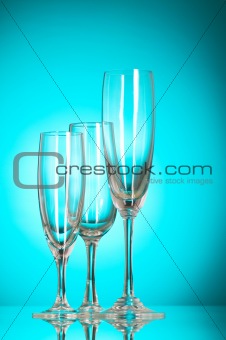 Wine glasses against colourful background