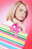 Blond girl with shopping bag 