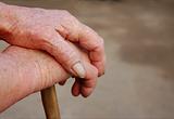 Old woman hands with wrinkled skin 