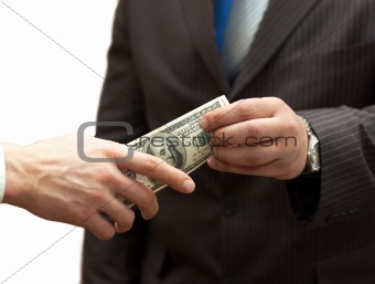 One man hands money to businessman