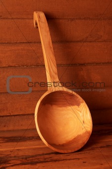 Wooden spoon in steam room. Russian baths.