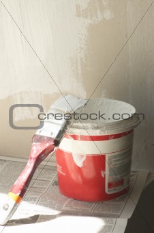 Renovation process:  Brush lean on pot with white paint