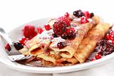 Crepes filled with chocolate and berries