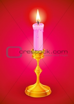 candle burning in candlestick