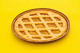 Sweet pie isolated on the yellow background