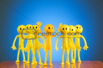 Leadership concept with smilies against gradient background