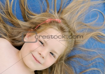 Little girl sunbathing