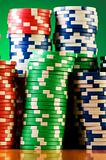 Stack of casino chips against gradient background