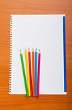 Binder and pencils isolated on the  background 