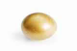 Golden egg isolated on the white background