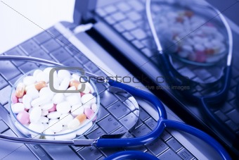 Laptop, notebook and Stethoscope