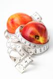 Tape measure and nectarines