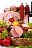 A composition of meat and vegetables with wine