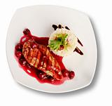 Delicious beef with cherry sauce. File includes clipping path fo