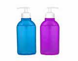 bottles of health and beauty products on white background