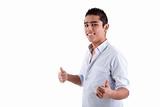 Young latin man with thumbs raised as a sign of ok, isolated on white background. studio shot