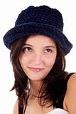Beautiful young woman smiling,with blue hat isolated on white, studio shot