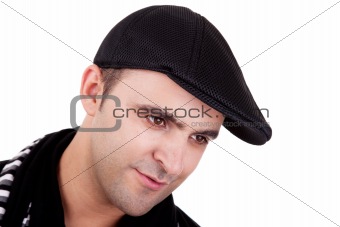 Portrait of a man smiling with his black hat, isolated on white. Studio shot