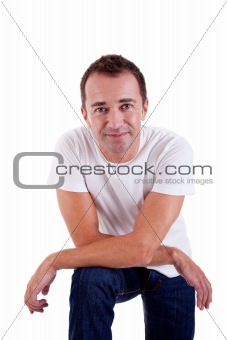Portrait of a handsome middle-age man smiling, on white background. Studio shot