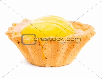 Cake with yellow cream isolated on white
