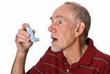 Old man using asthma inhaler