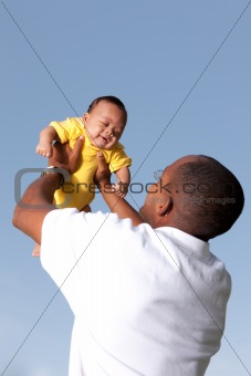 Father and child playing