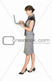  Beautiful businesswoman with laptop