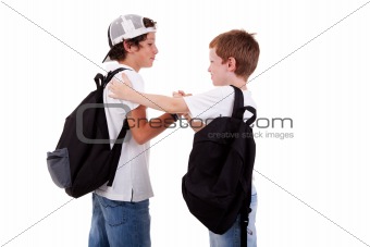 boys going to school, greeting one another, seen from the back, on white, studio shot