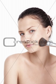 Attractive girl with a brush