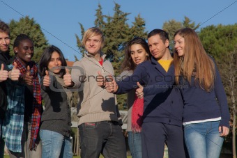 Happy College Students with Thumbs Up
